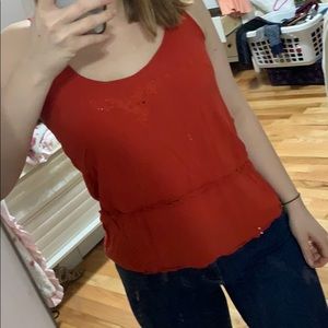 Orange embroidered flower top